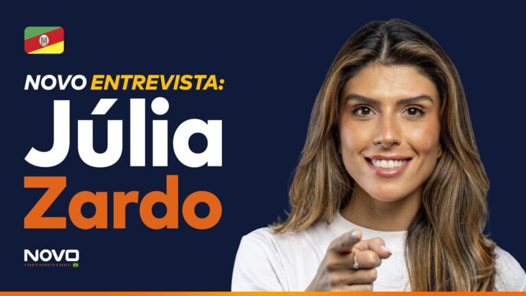 A imagem mostra a frase “NOVO Entrevista - Júlia Zardo” ao lado do candidato a deputado federal pelo Rio Grande do Sul, Júlia Zardo.